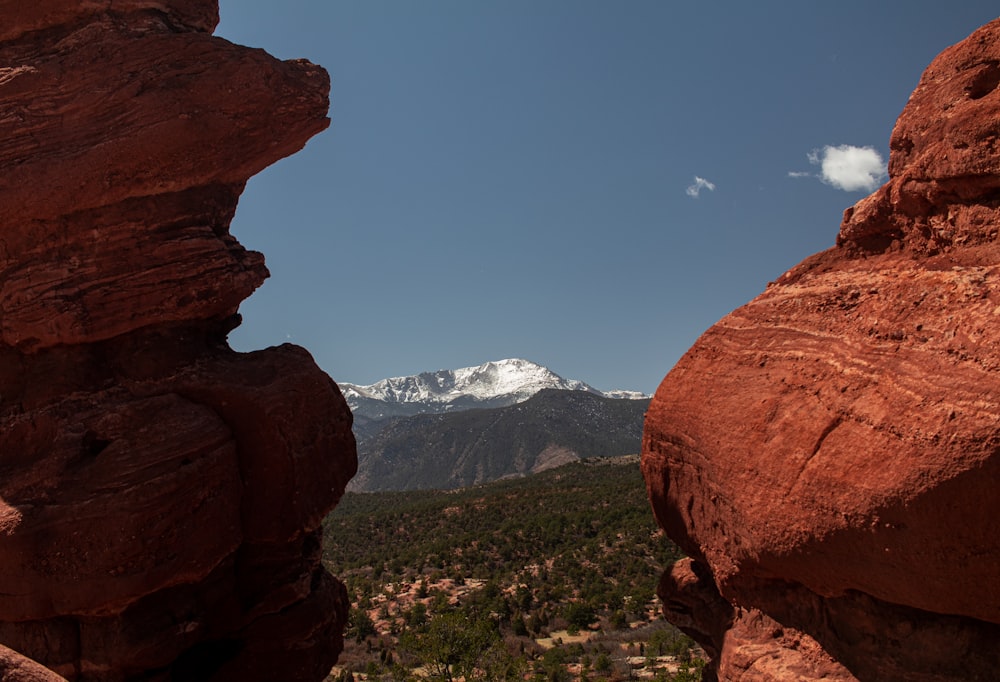 a view of a mountain from a cliff