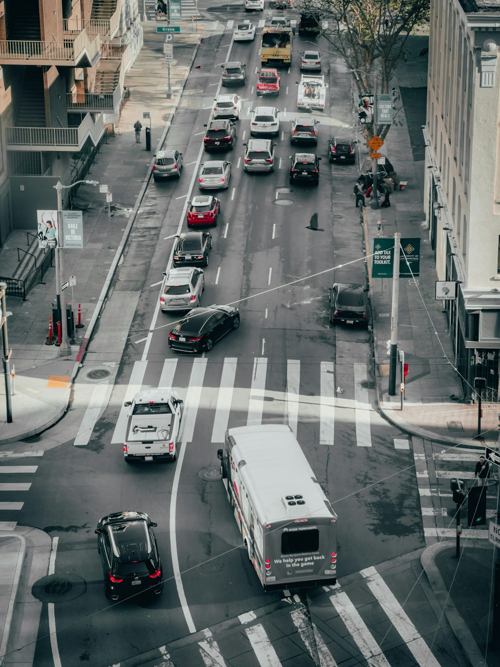 a busy street with cars and buses