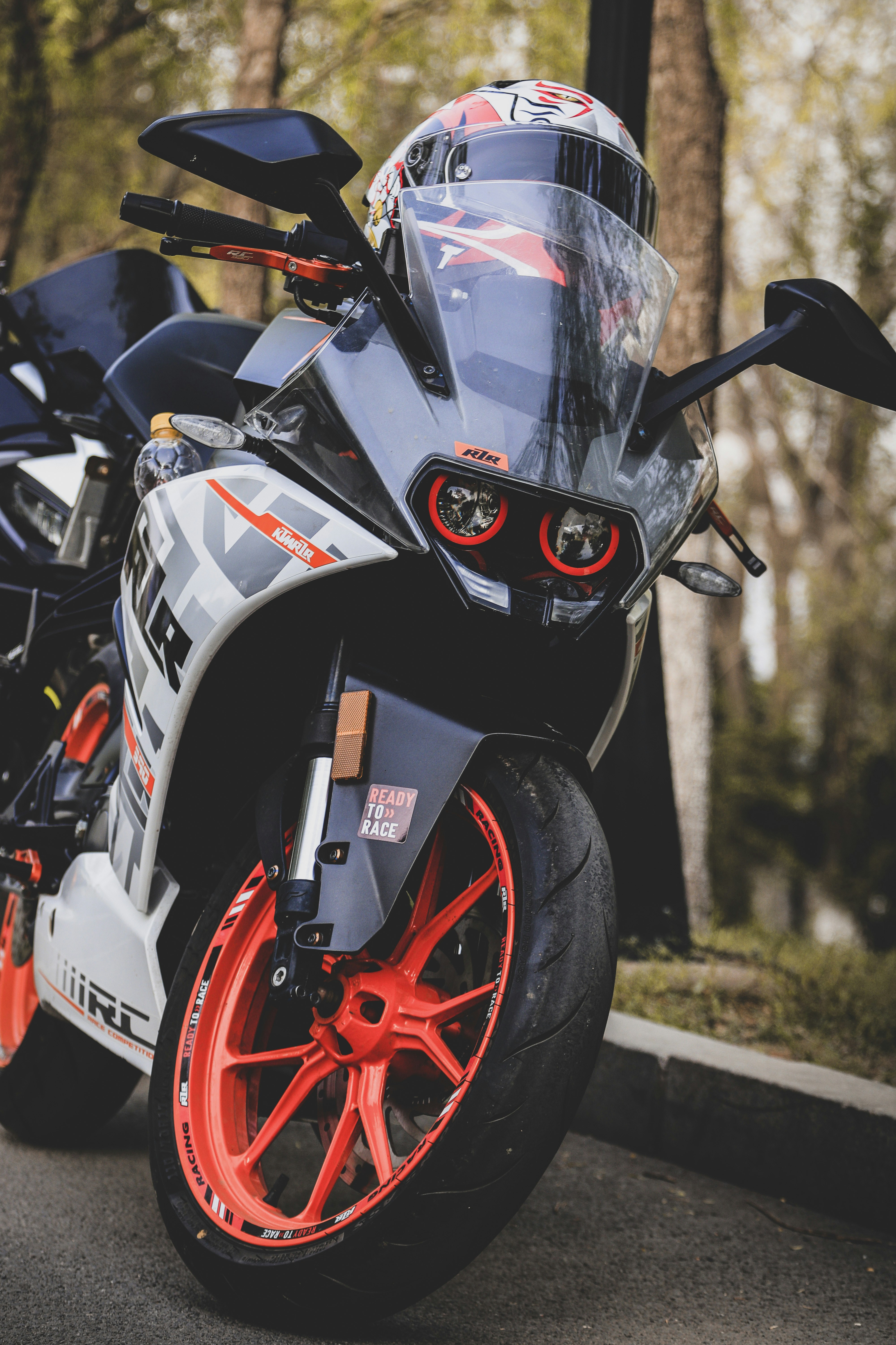 A motorcycle parked on the side of the road photo – Free ...