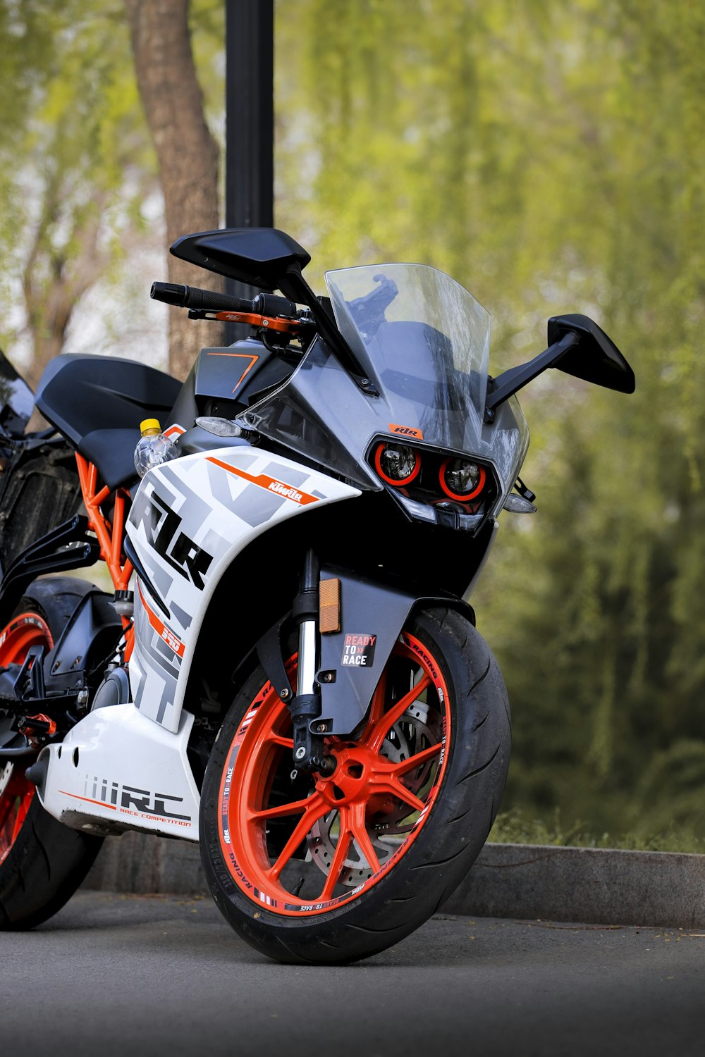 a motorcycle parked on the side of a road