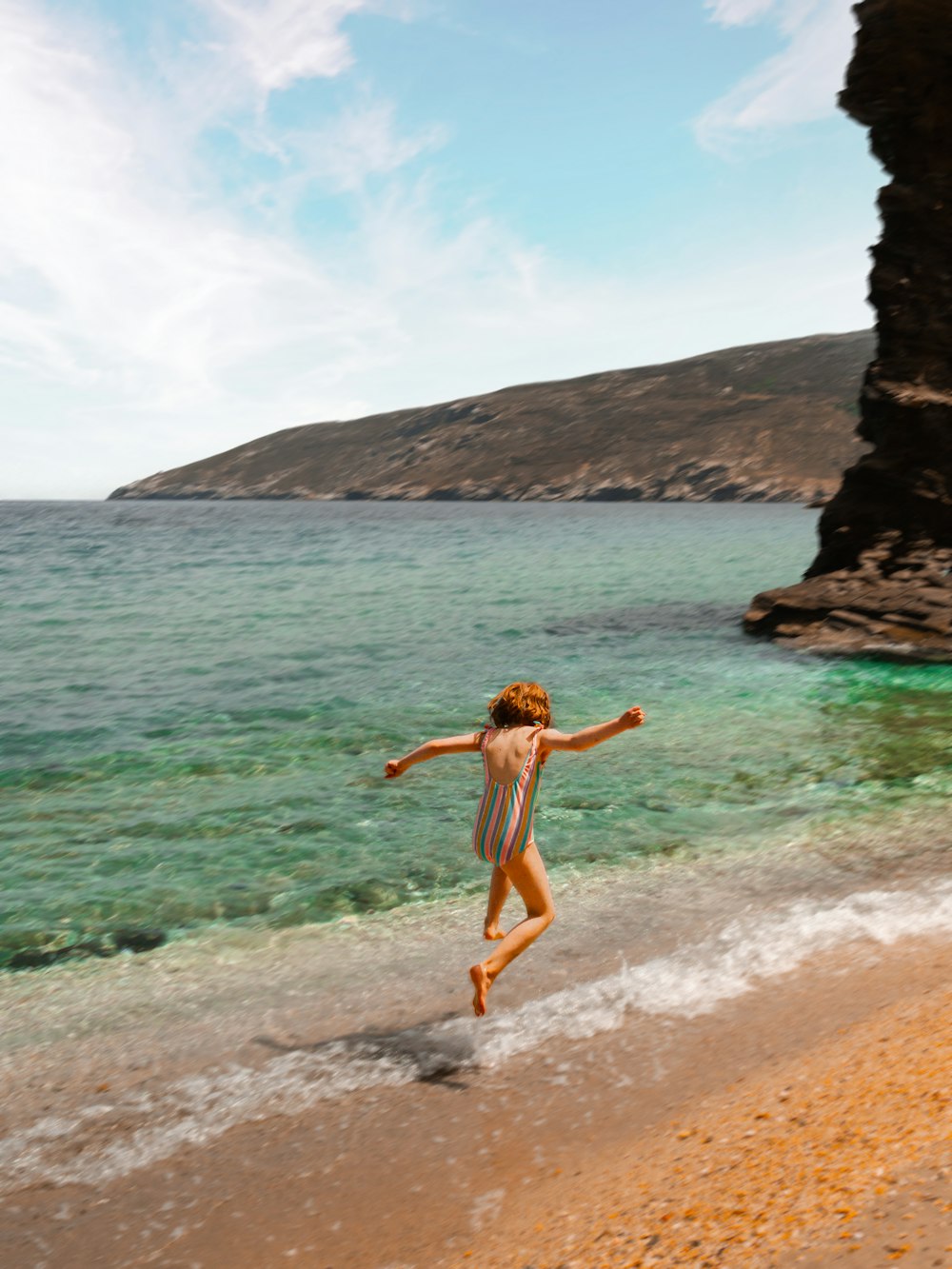 a man jumping into the water