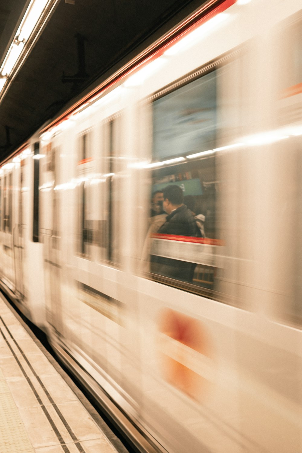 a train travels down the tracks