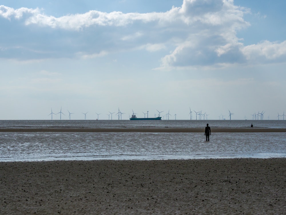 a person walking on a beach