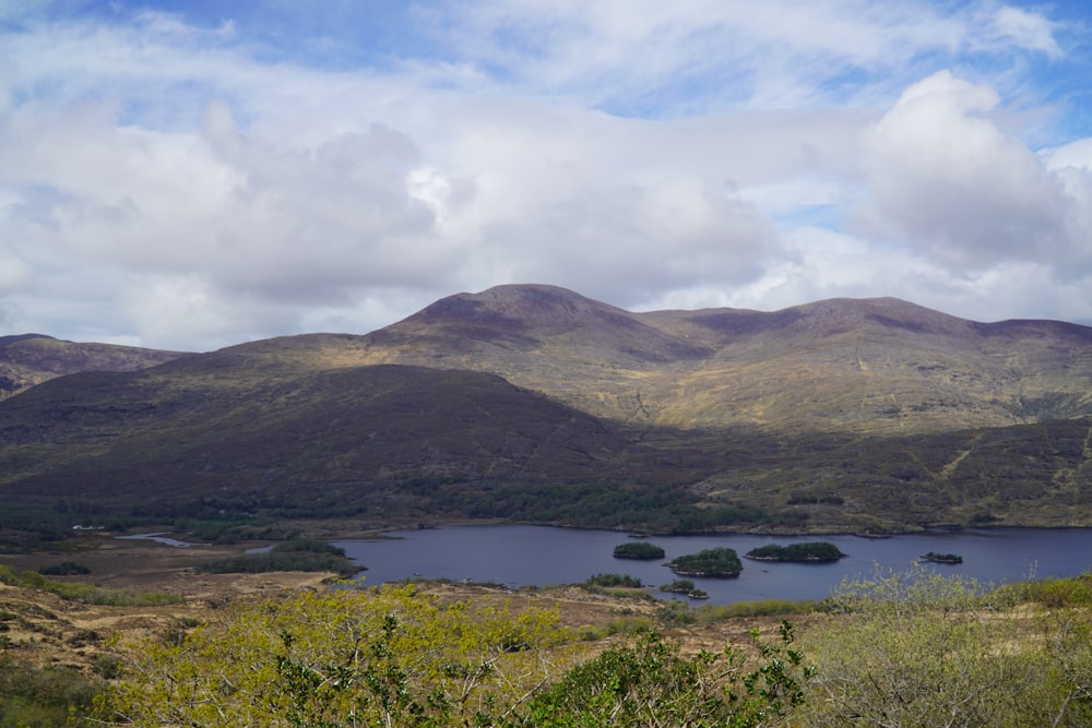 a lake surrounded by hills