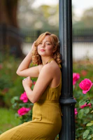 a woman in a yellow dress