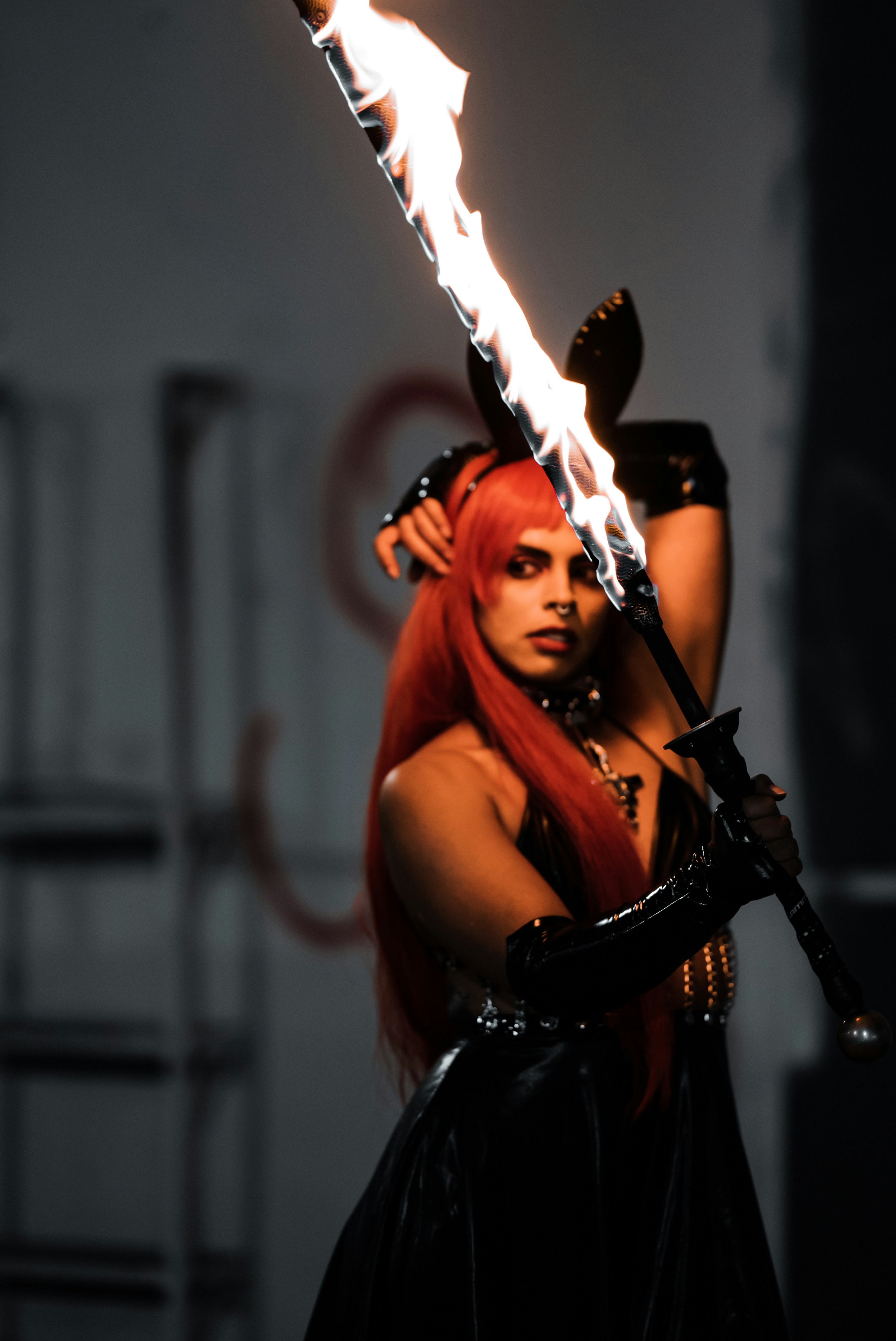 a woman holding a sword