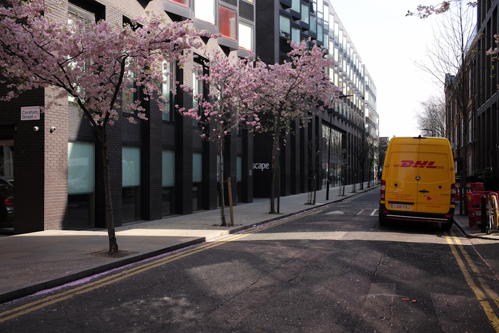 a yellow van parked on the side of a street