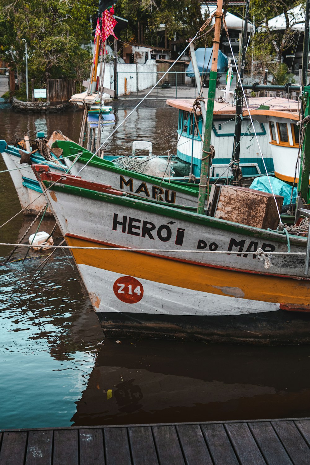 a boat docked at a pier