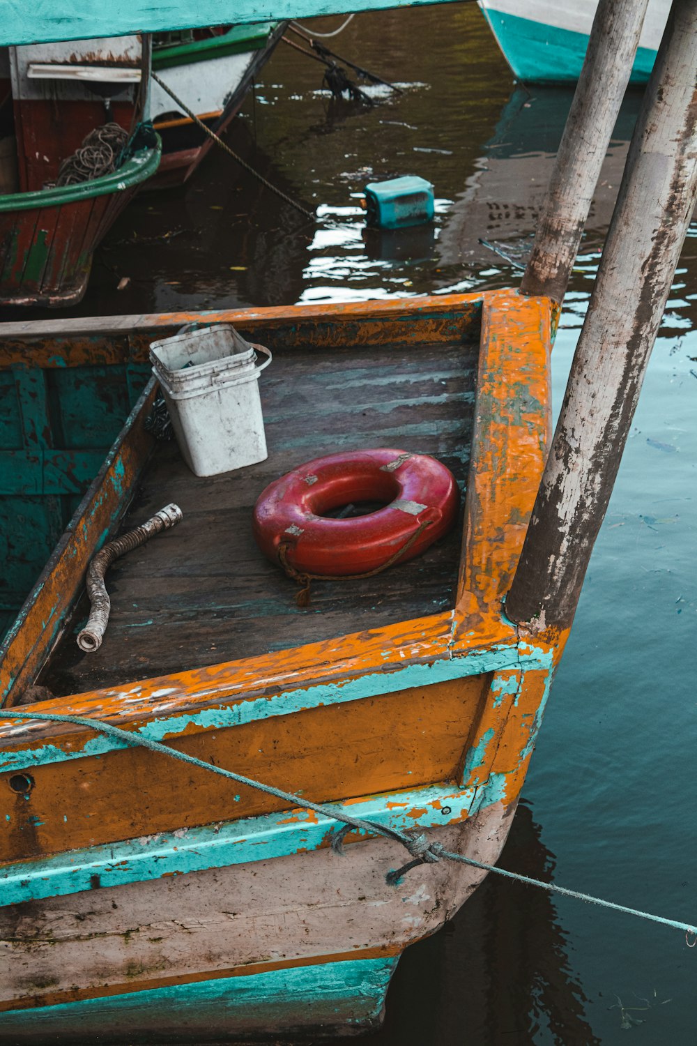 a boat is tied to a dock