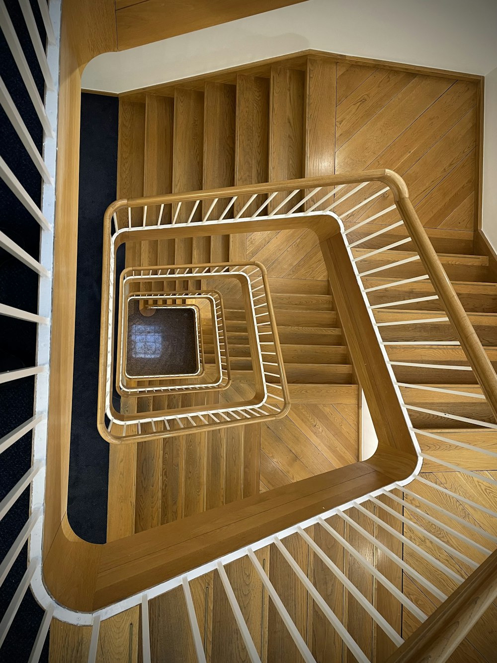 a wooden staircase with a window