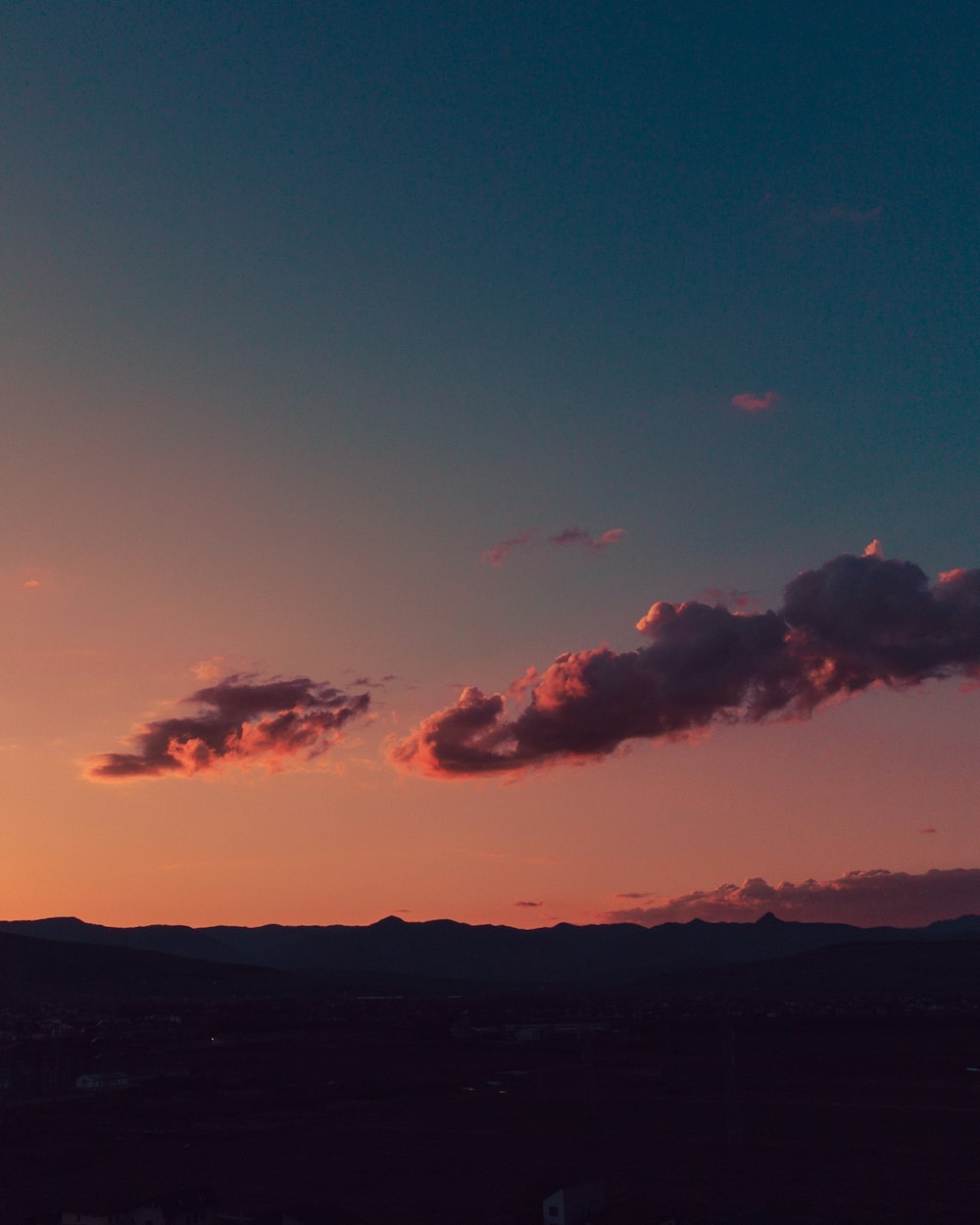 a sunset with clouds