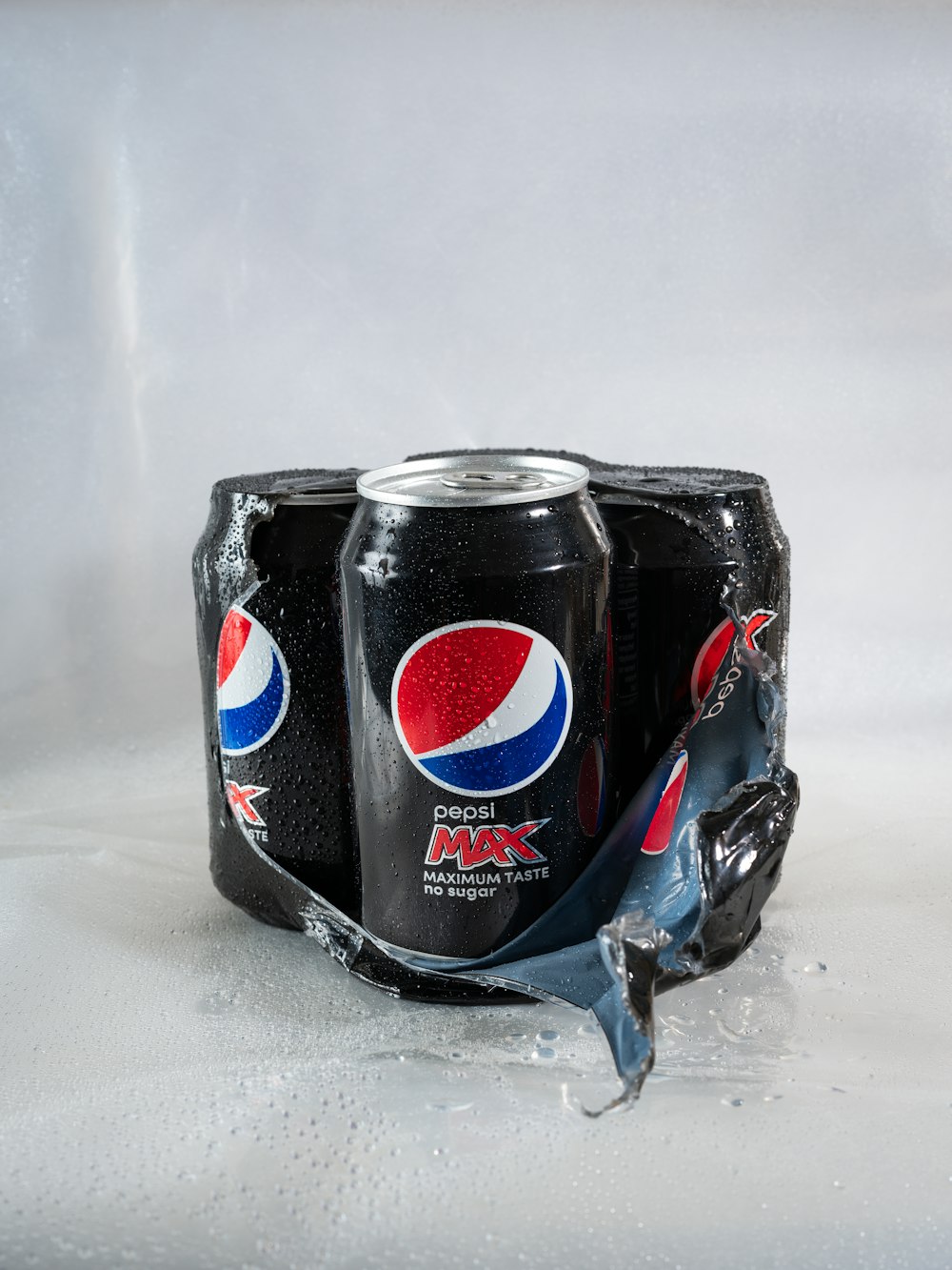 a black can with a red logo