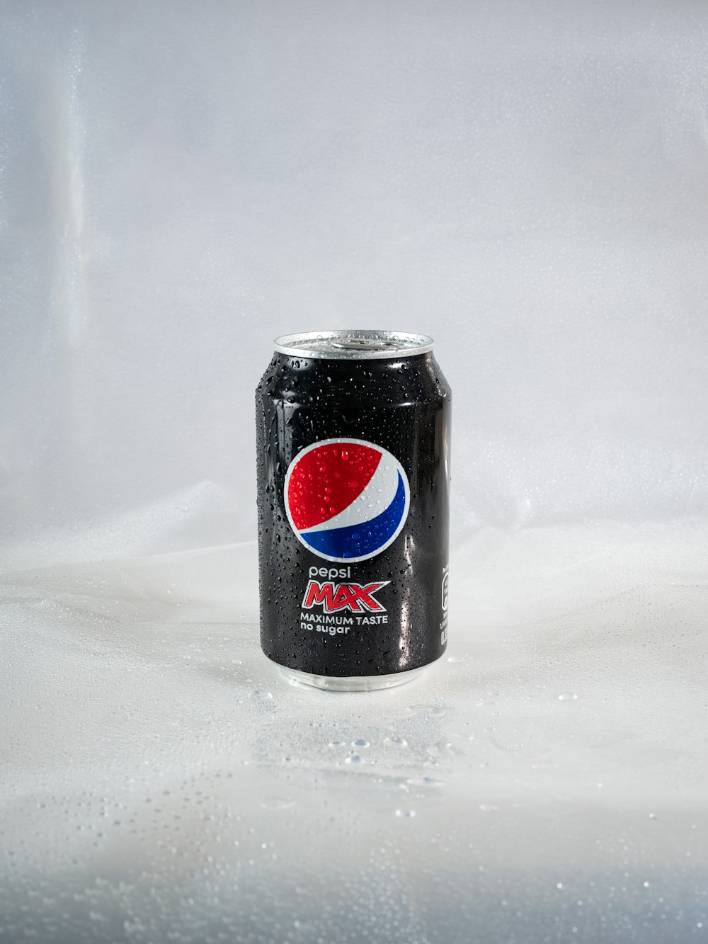 a black can of soda