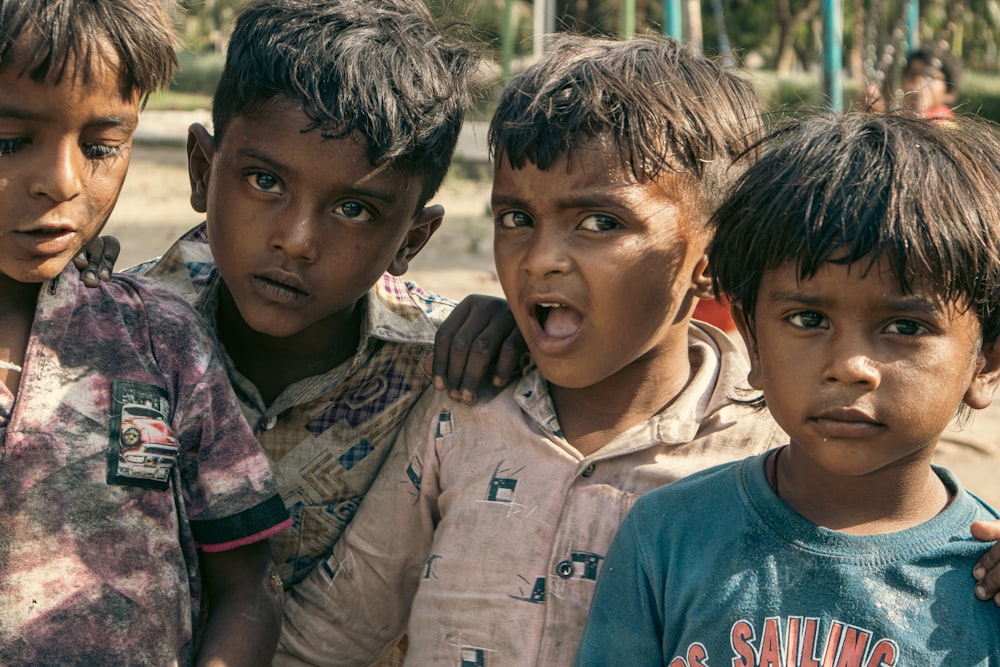 a group of boys posing for a photo