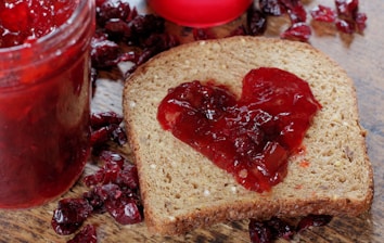 a piece of bread with jam and jam on it