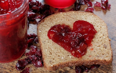 a piece of bread with jam and jam on it