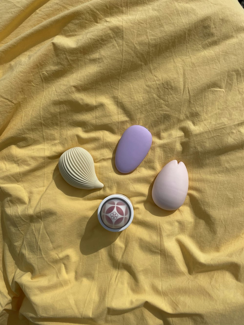 a group of hats on a blanket