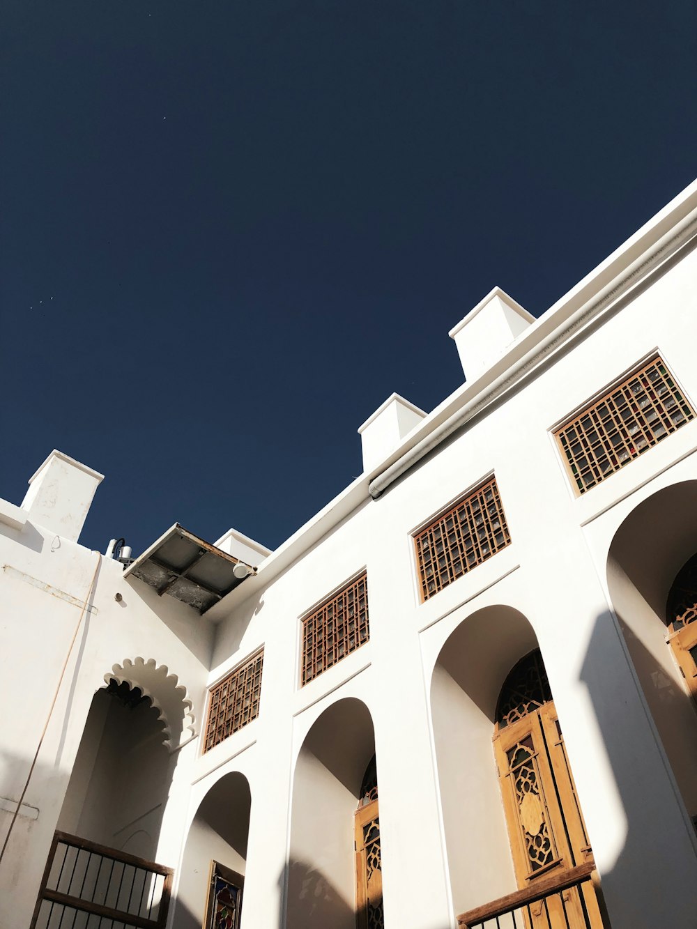 a white building with a blue sky