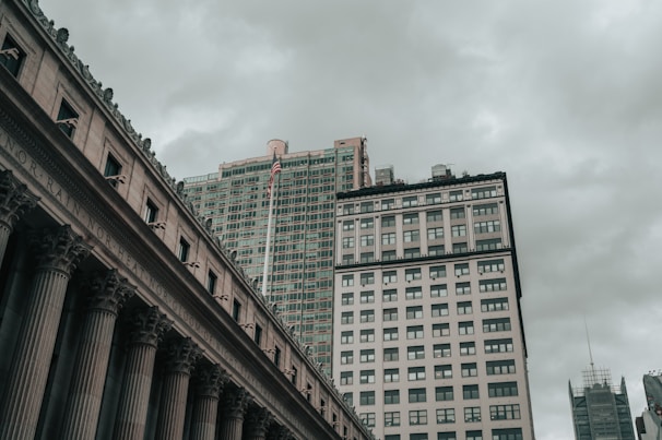 a bridge with a building in the background