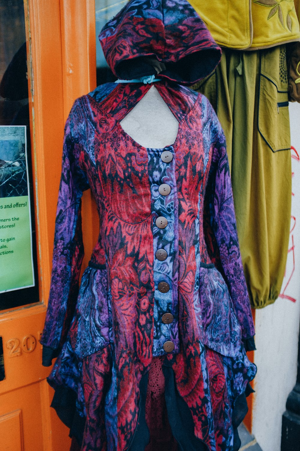 a colorful dress on display