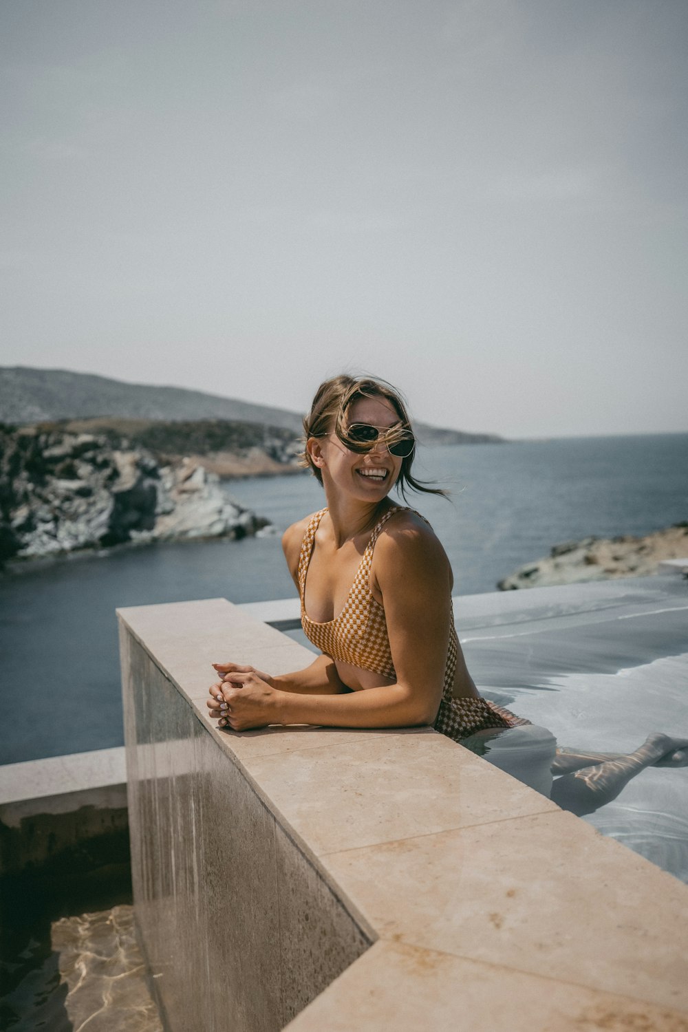 a person sitting on a dock