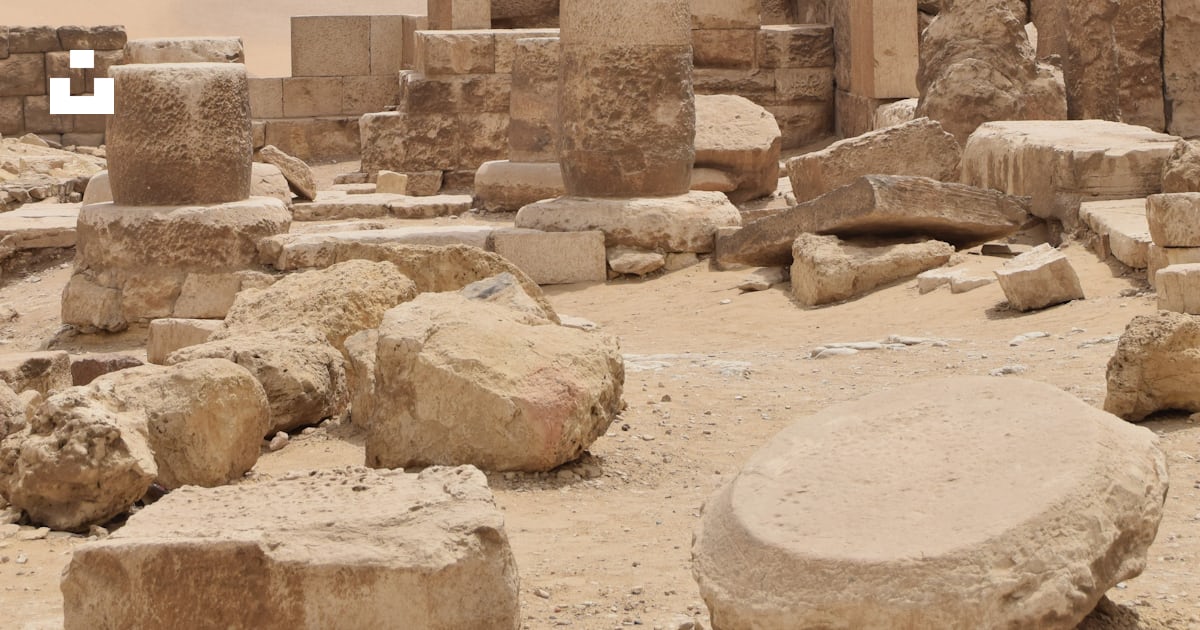 A stone structure with a tall column photo – Free Pyramids of giza ...