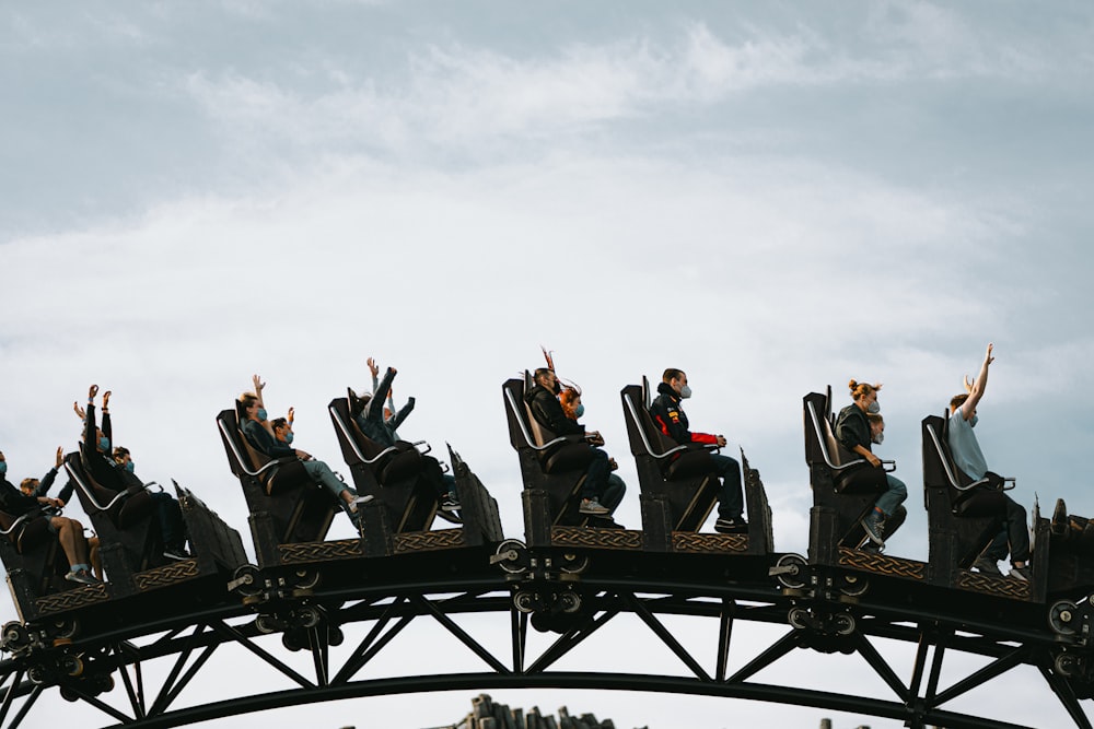 a group of people on a roller coaster