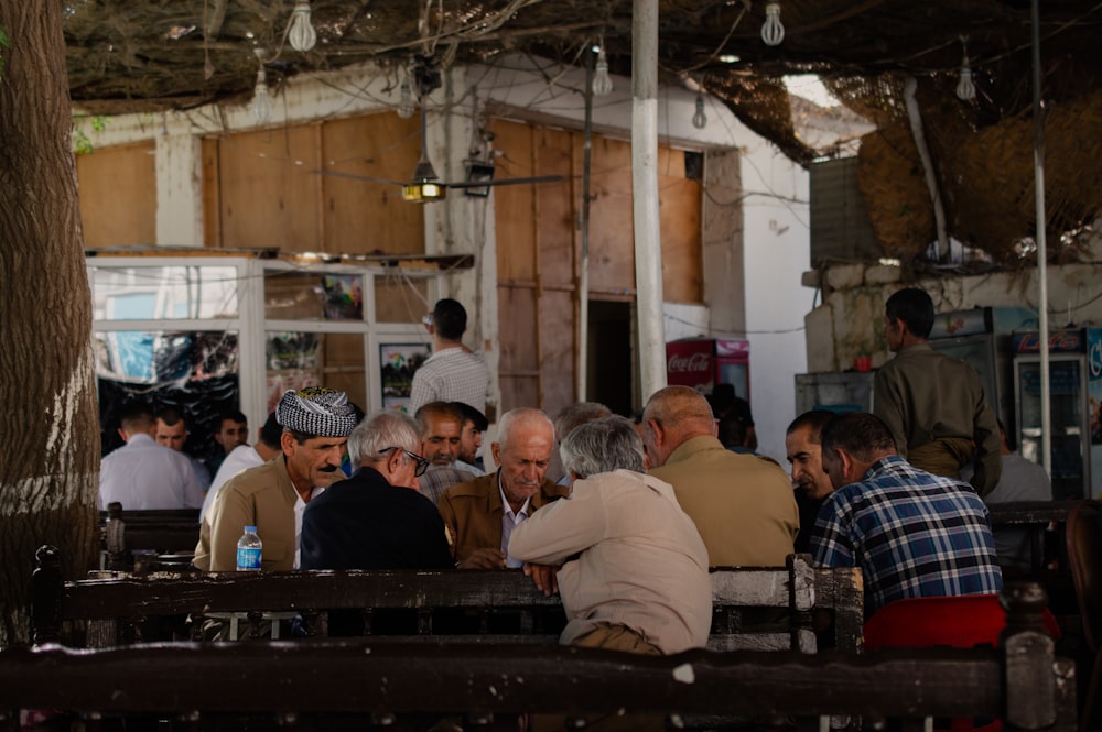 a group of people sitting at a table