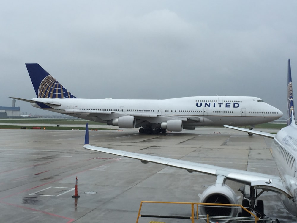 a large airplane is parked at an airport