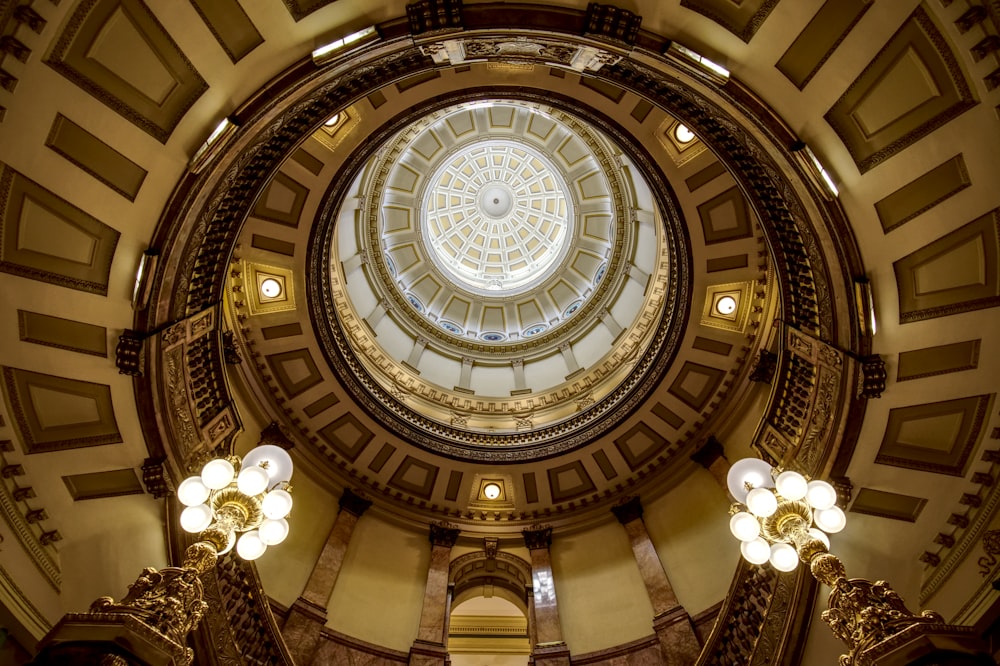 a large ornate ceiling with chandeliers