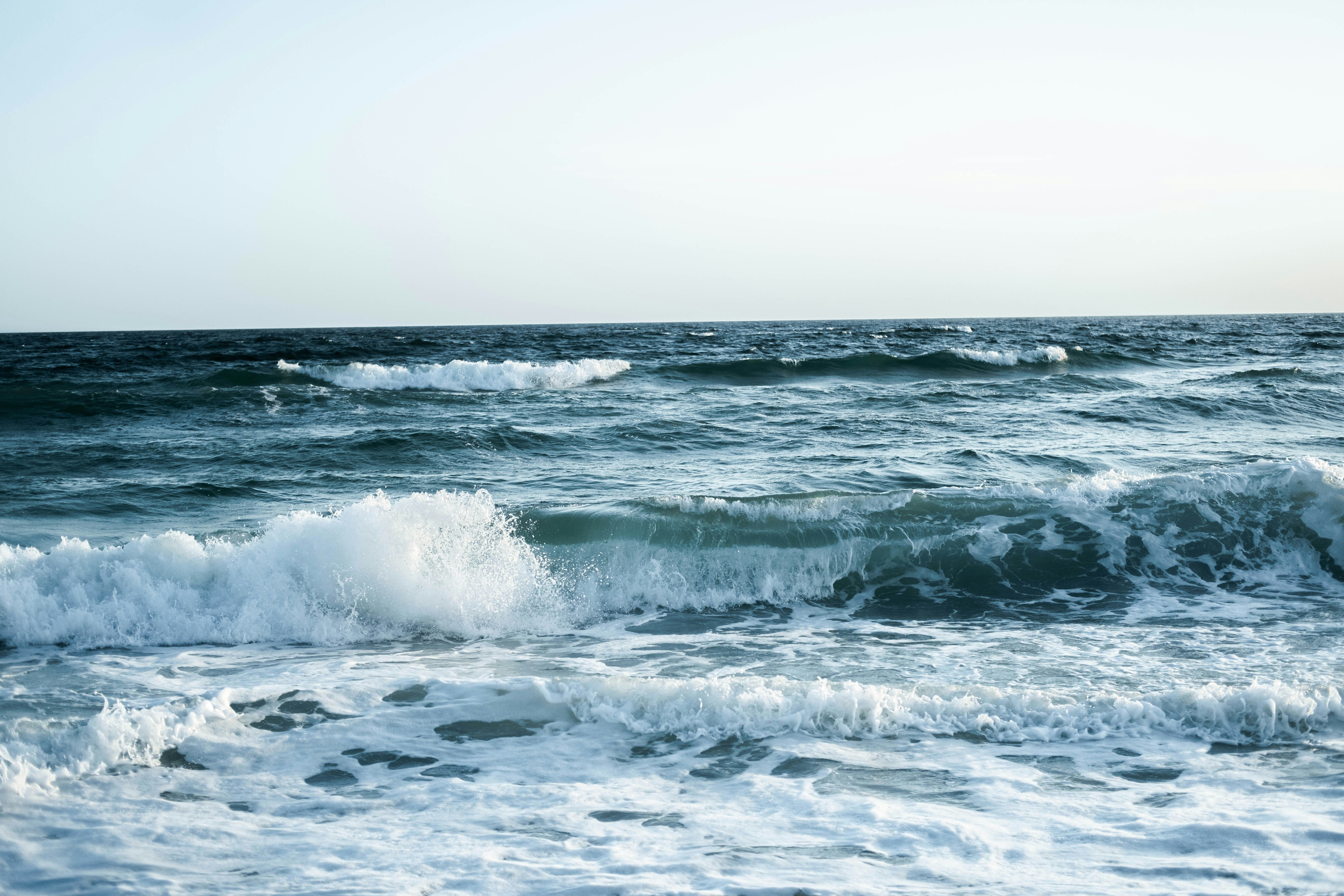 Waves on a beach photo – Free Panama city beach Image on Unsplash