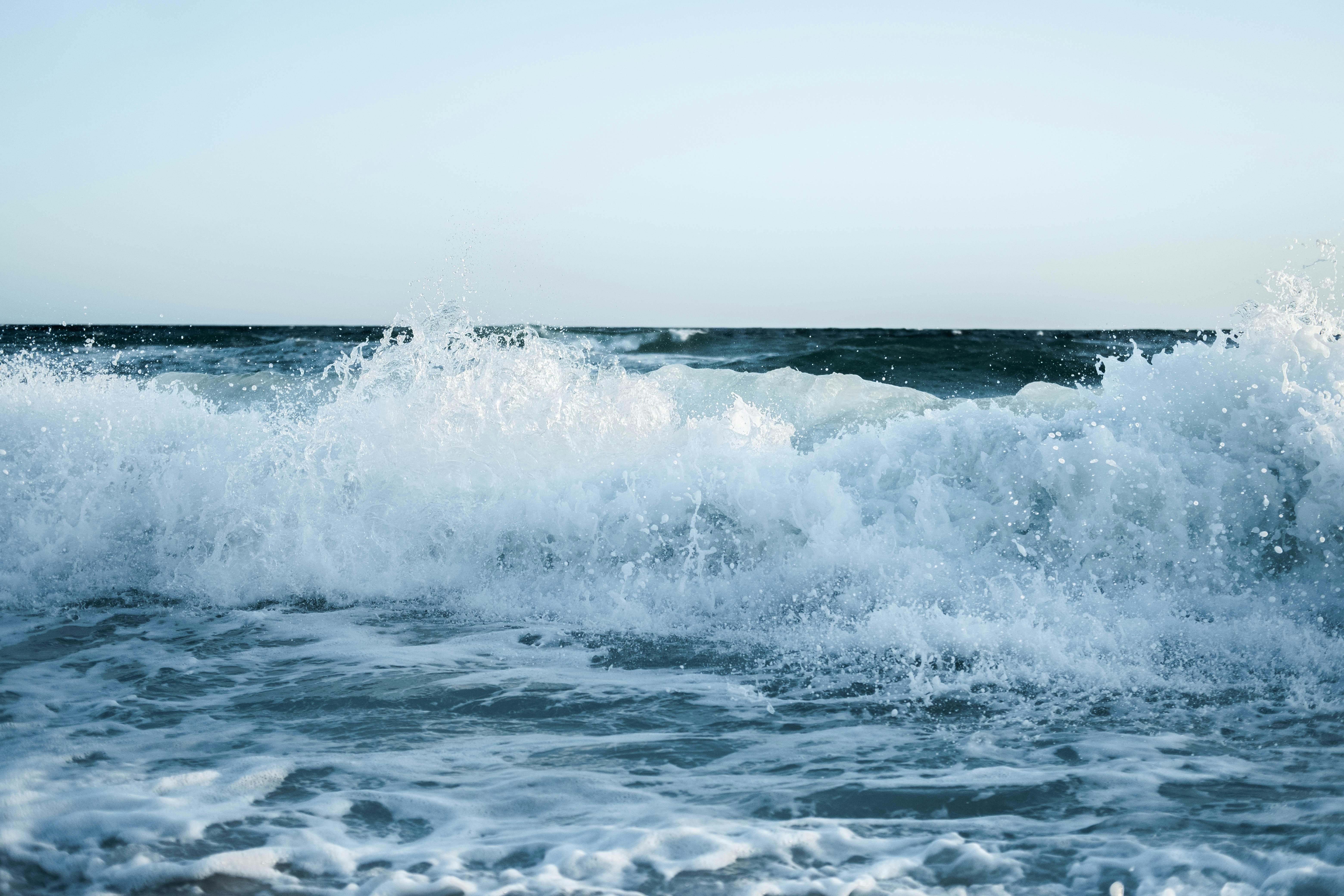 Waves crashing on a beach photo – Free Panama city beach Image on Unsplash