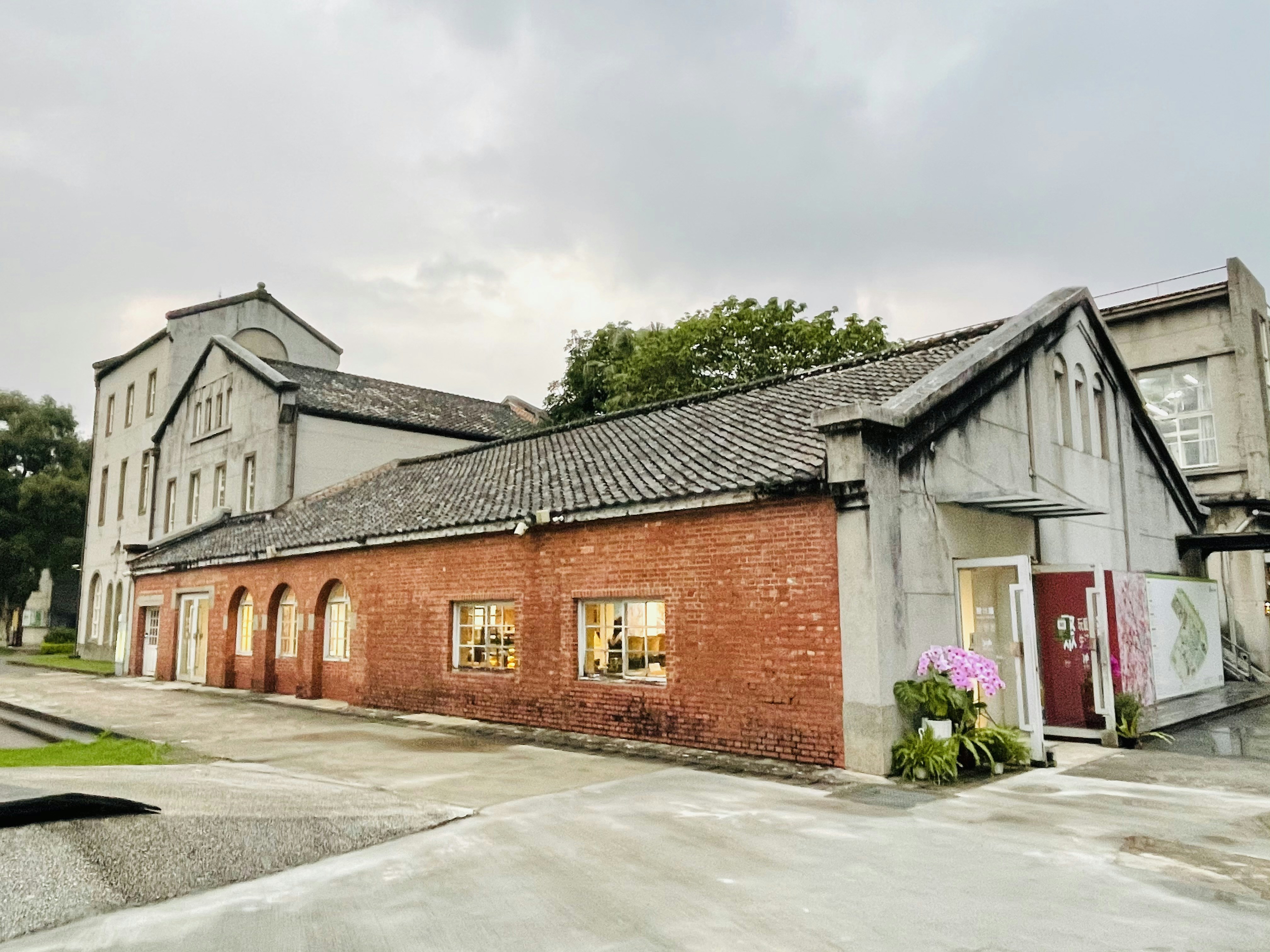 Historic brick building with driveway