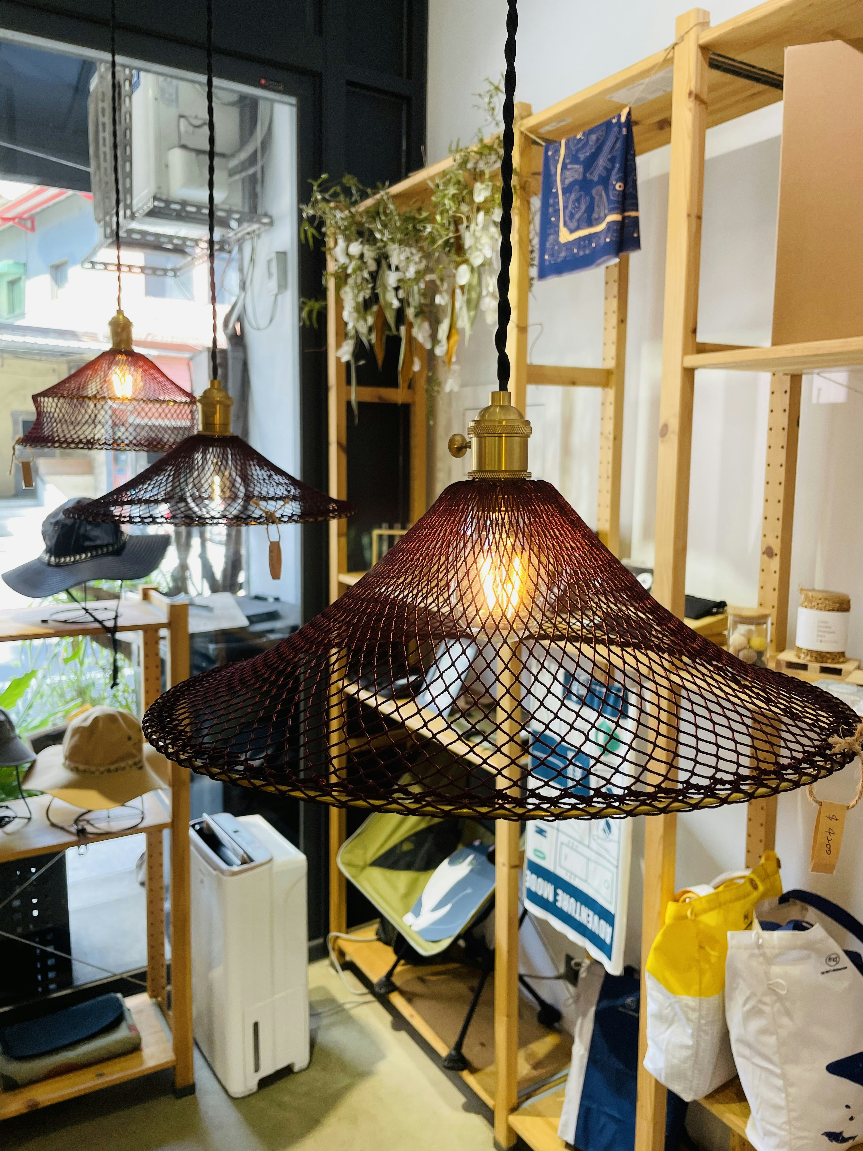 a room with a table and umbrellas