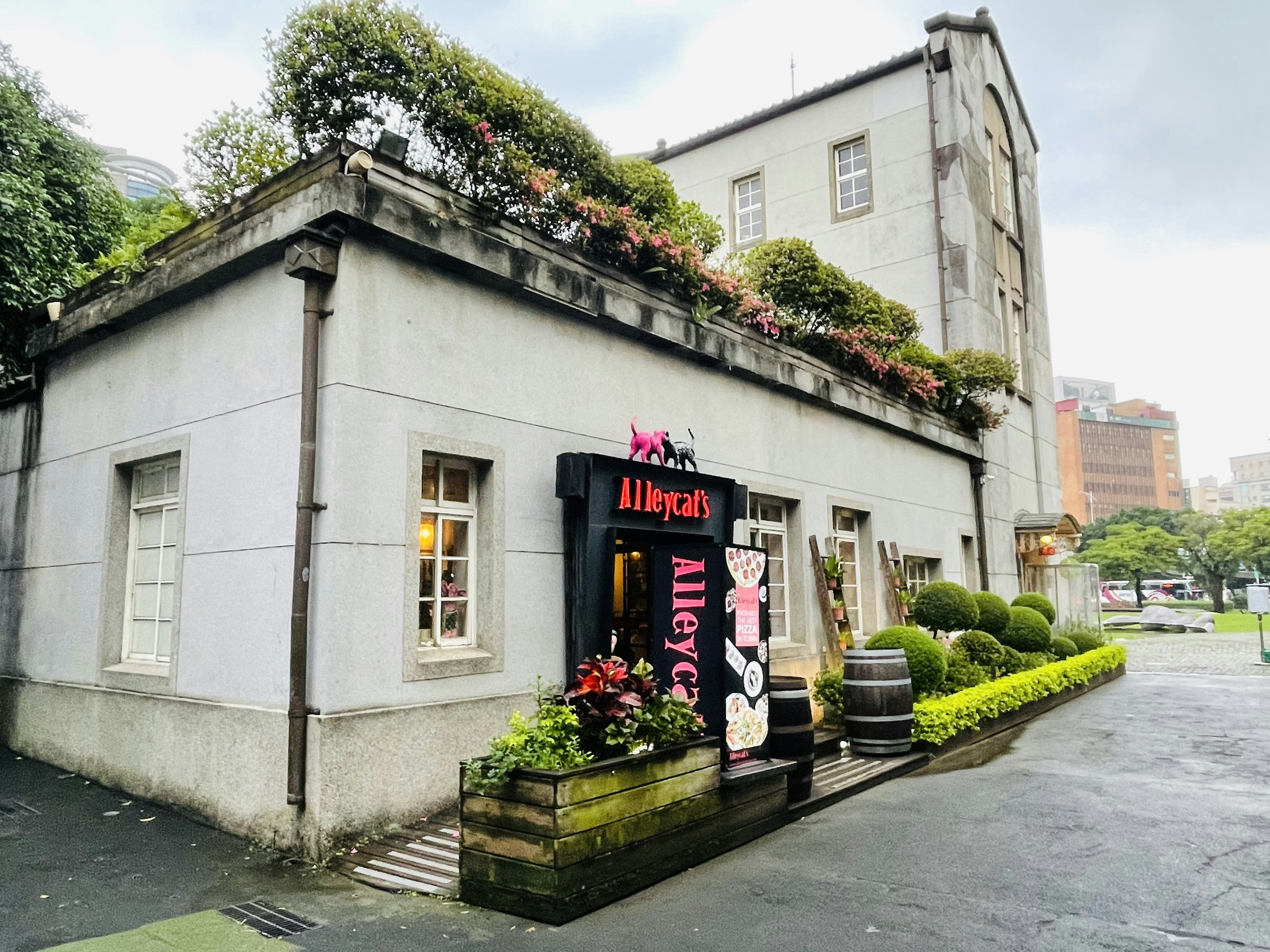 a white building with a sign on it