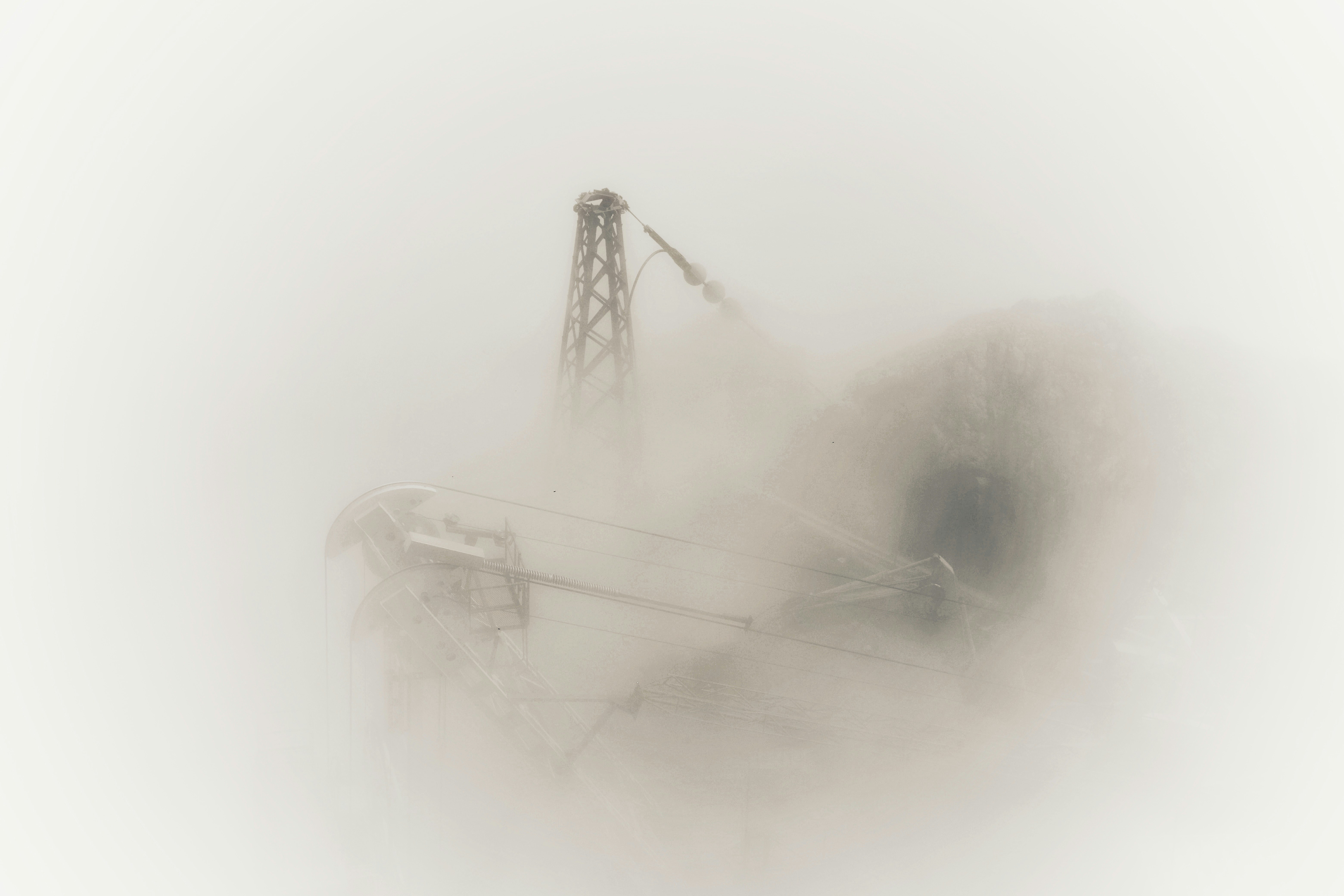 a tower in the fog