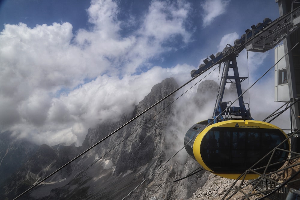 a cable car going up a mountain