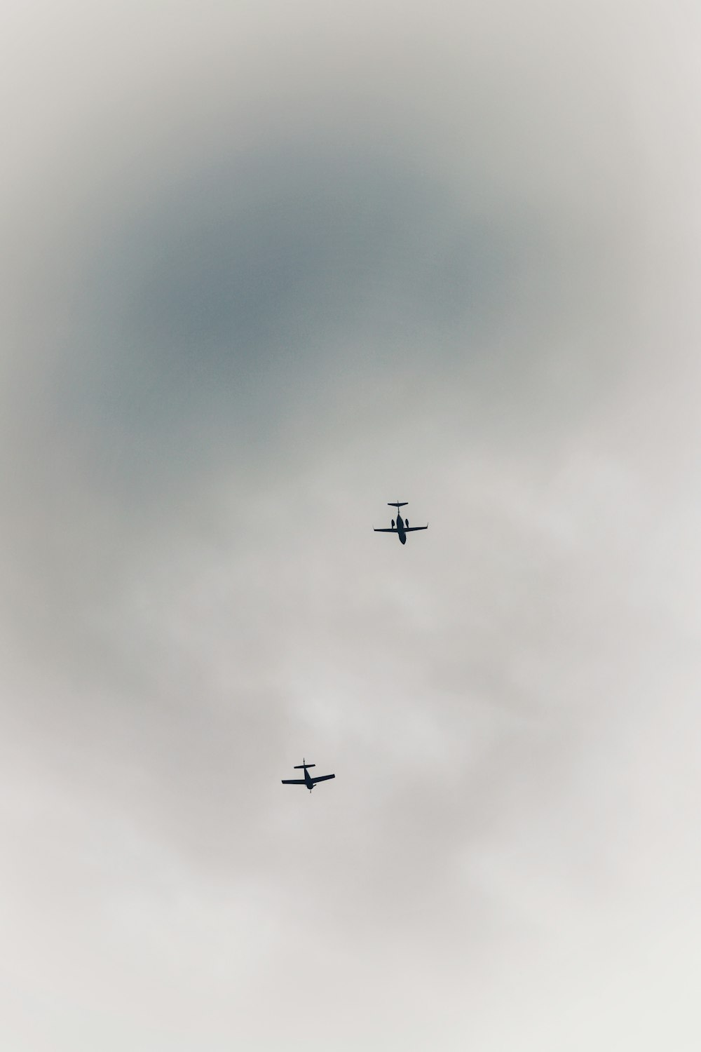 two planes flying in the sky