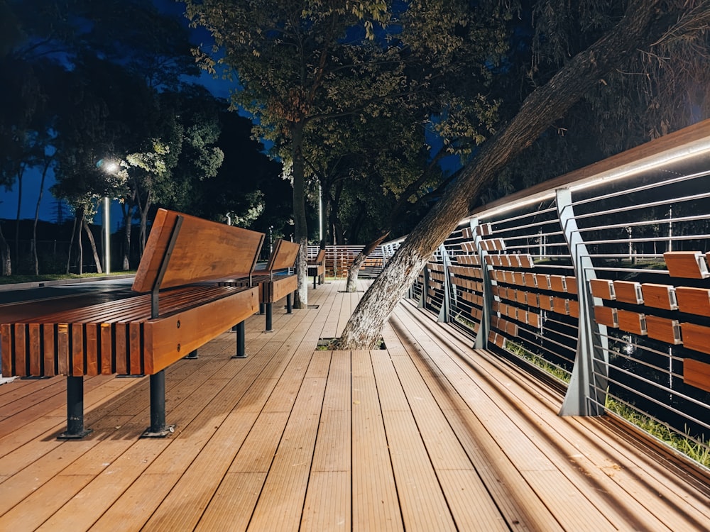 a wooden bridge with benches