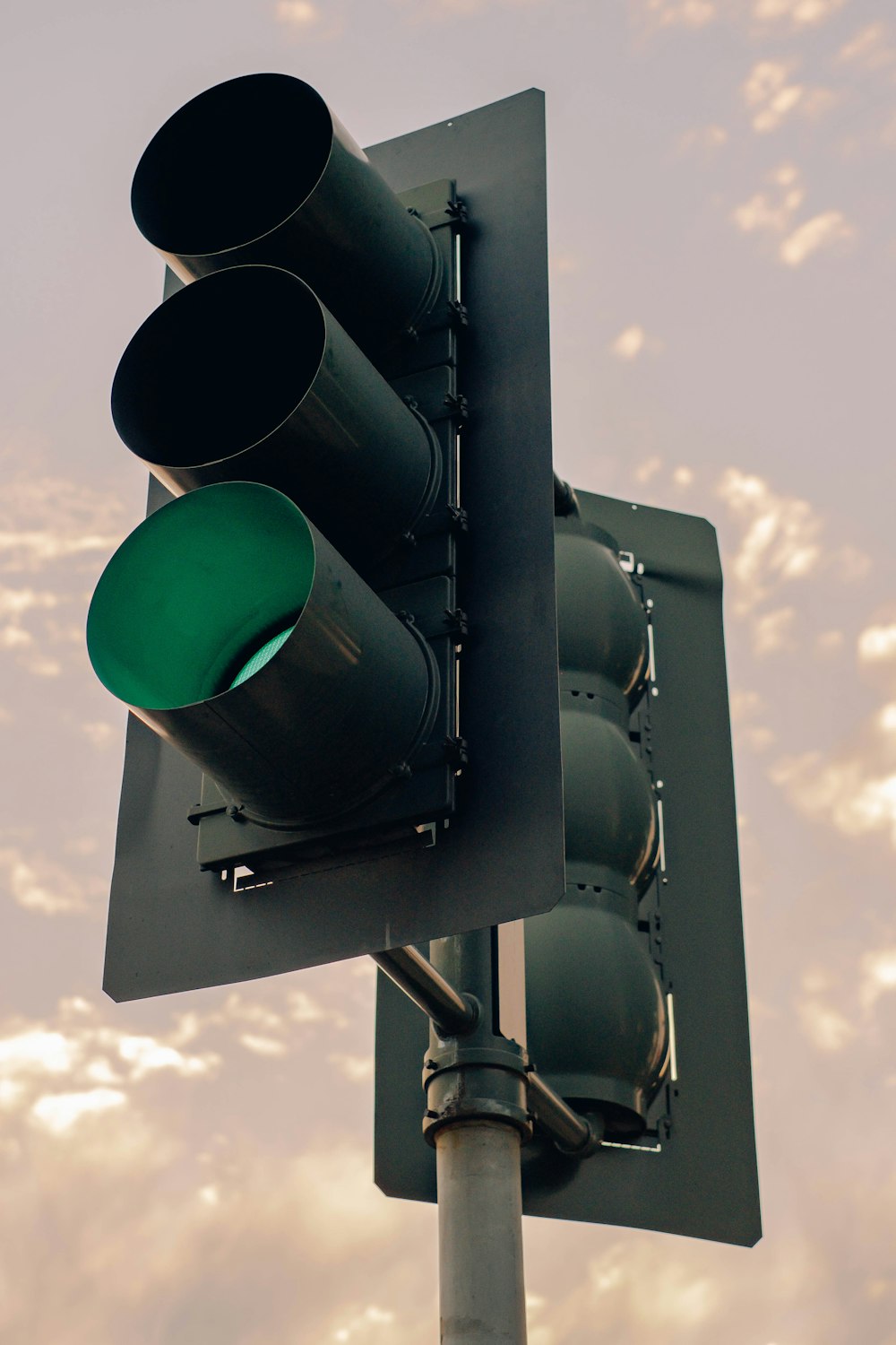 a traffic light with green lights