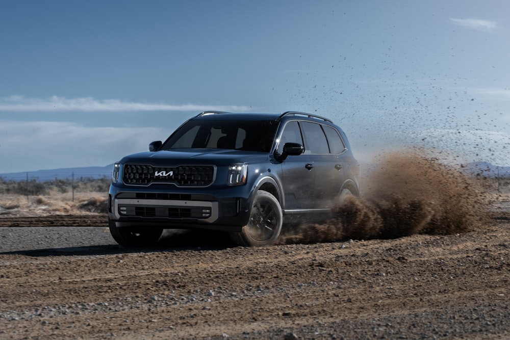 a car driving on a dirt road