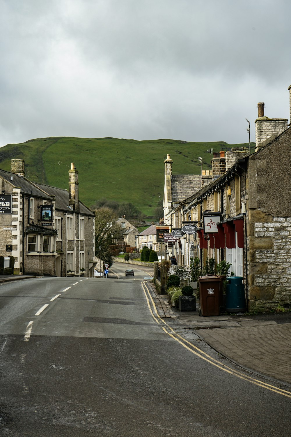 a road with buildings on the side