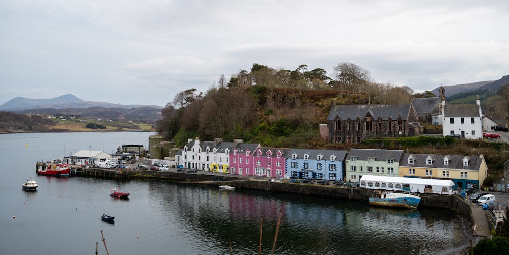 a body of water with buildings along it and boats on it