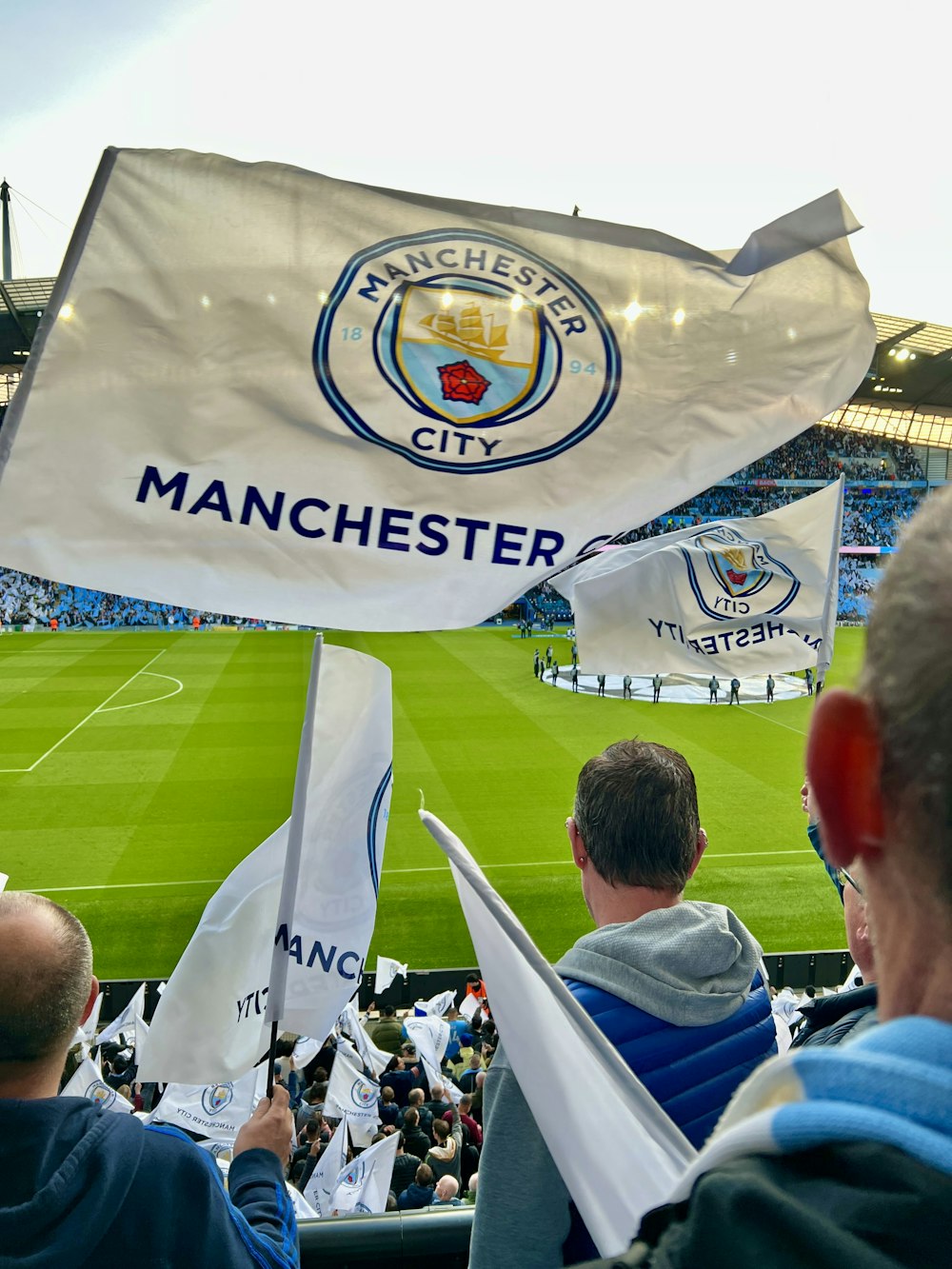 a group of people holding flags