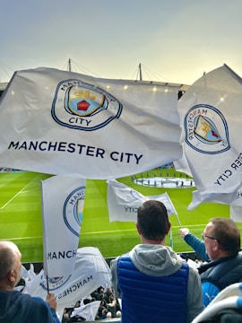 a group of people holding flags