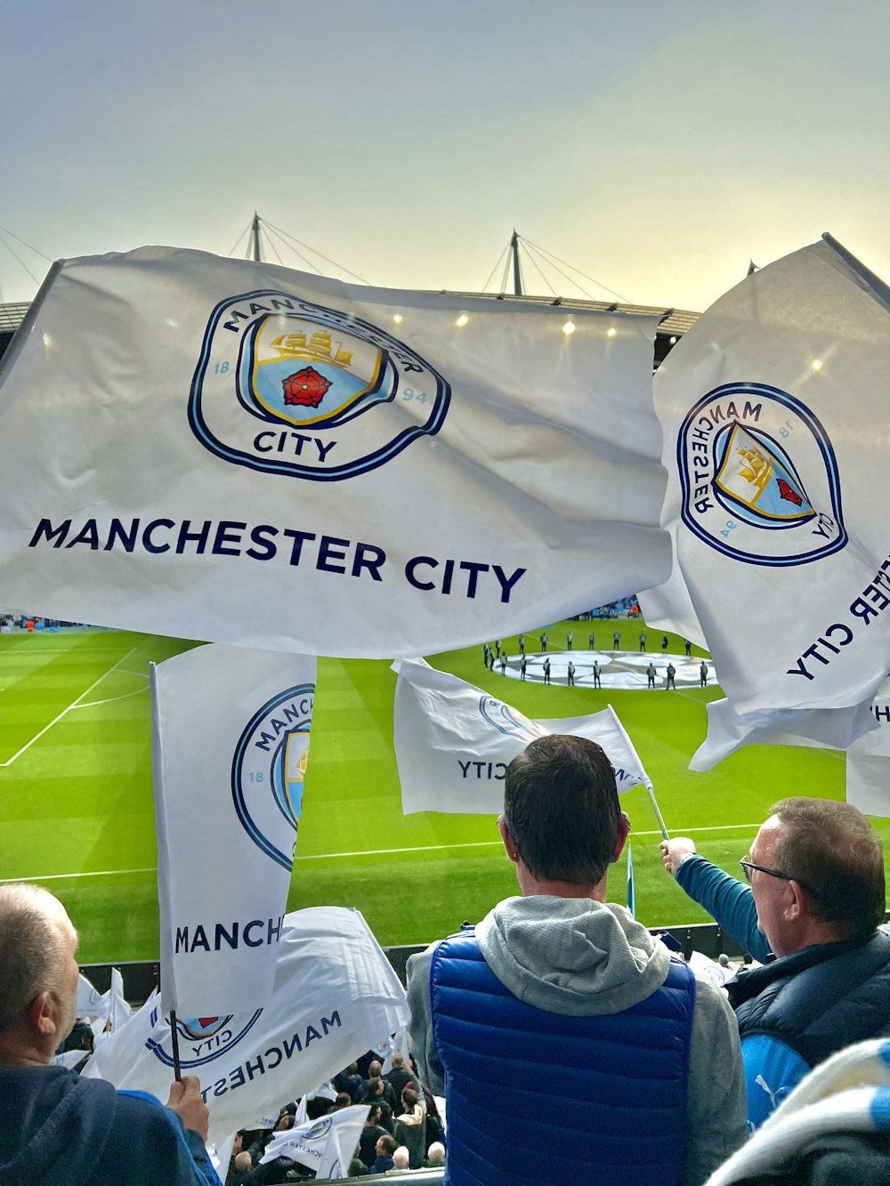 a group of people holding flags