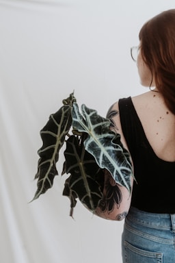 a woman with a tattoo on her arm