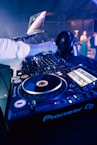 a person working on a dj turntable