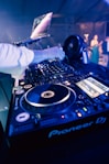 a person working on a dj turntable