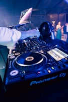 a person working on a dj turntable